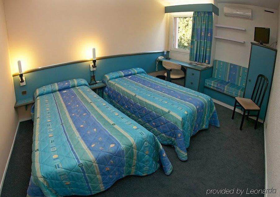 Brit Hotel Dak Hotel Avallon Room photo